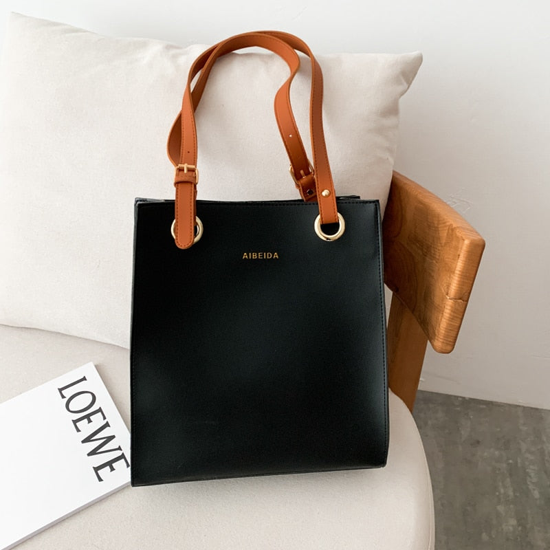 Fourre-tout de créateur pour femme : sac à bandoulière en cuir de luxe